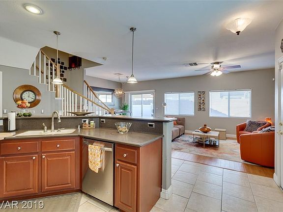 5th image of 8674 Traveling Breeze Ave Unit 102