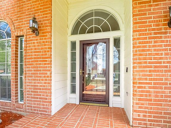 Bricked front porch entry is a nice upgrade.