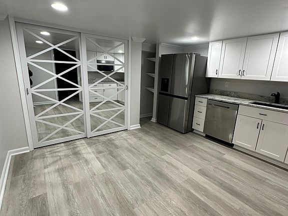 Decent size living/dining area with large closet and pantry.