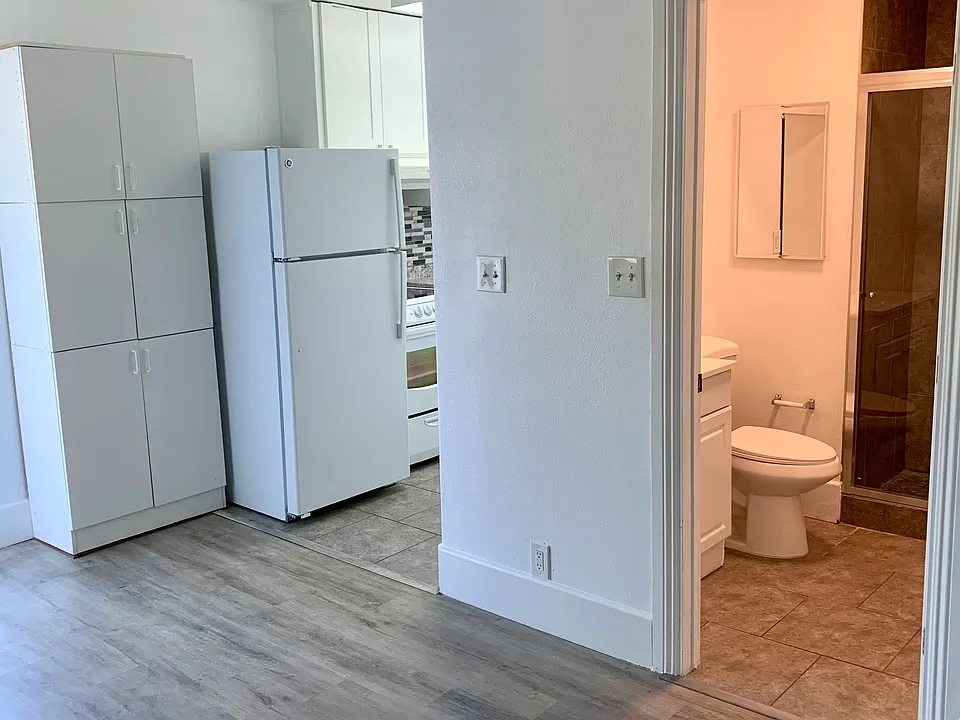 View of kitchen and bathroom