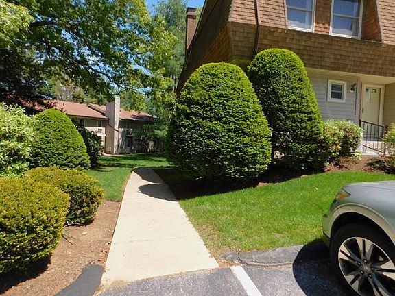Sidewalk from parking space to unit entrance
