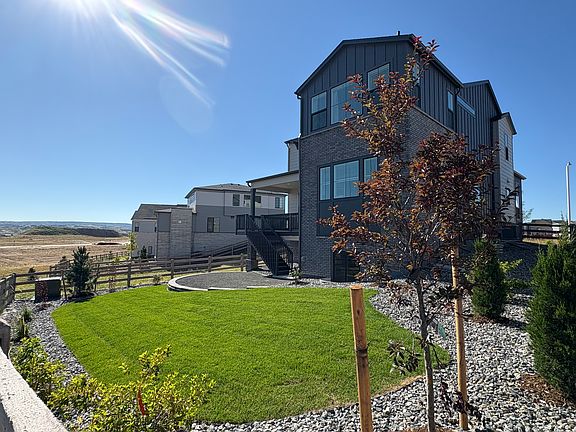 Spacious, fenced-in backyard for families or entertaining, faces open space on two sides