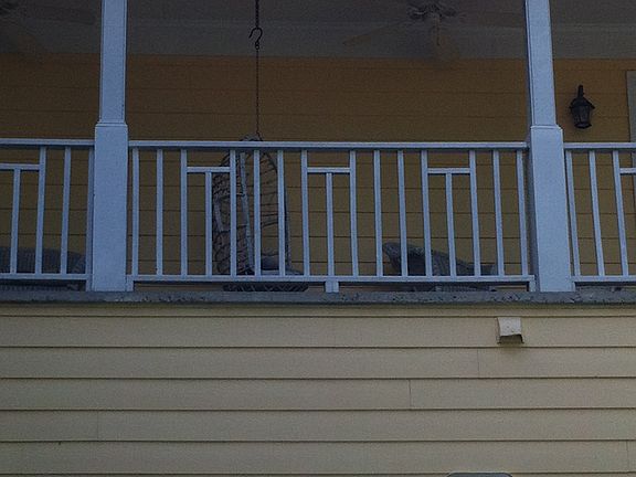 Covered upstairs balcony