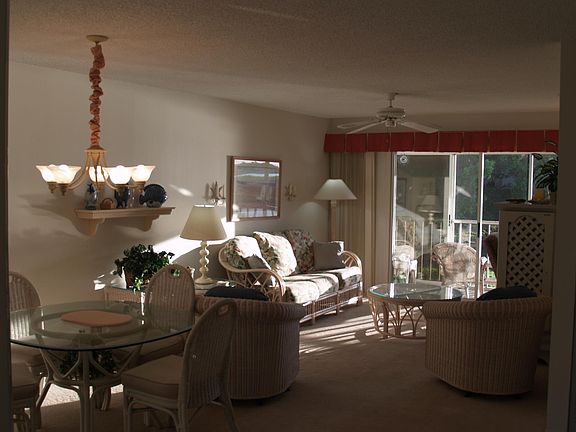The sun streaking across the screened in porch into the living room and dining room. From all three rooms, the view is the water and sunsets.