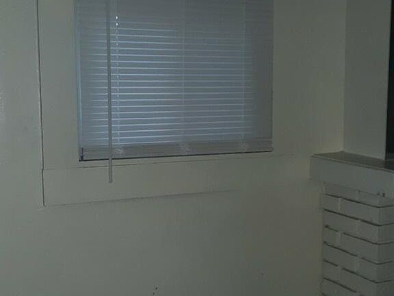 Liv rm - side fireplace window