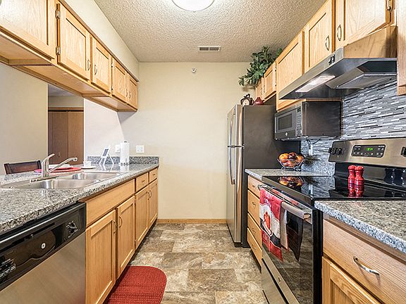 A wonderful galley style kitchen with upgraded features.