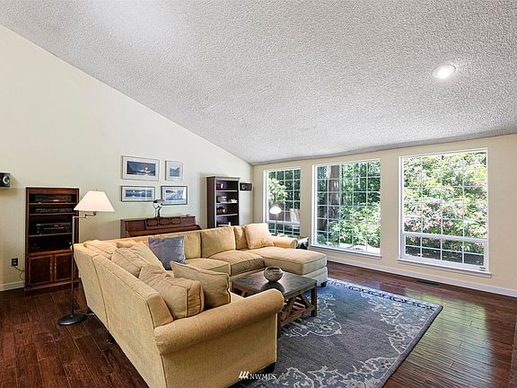 Vaulted ceilings, clear story windows and beautiful wood floors are just the beginning.>