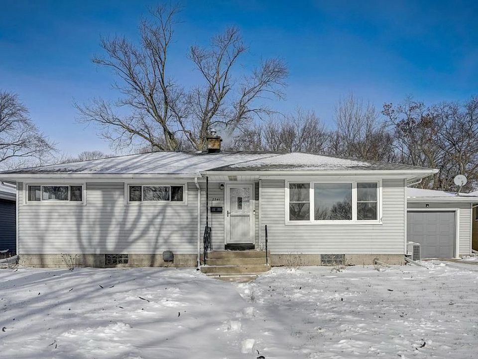 Ranch home with a full finished basement and a one and a half car garage