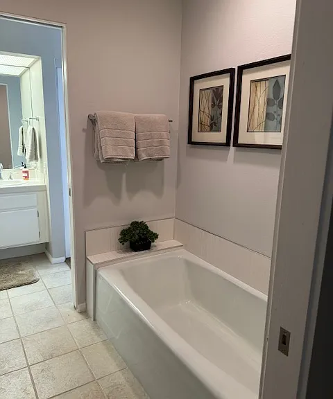 Bathtub in primary bath.