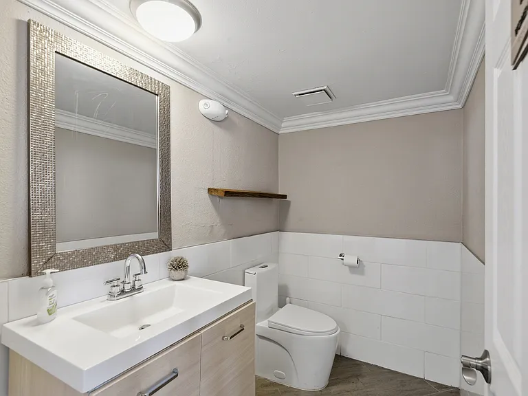 Elevate your living experience at Wymore 360 Apartments. This modern bathroom features sleek finishes and a spacious layout, perfect for your comfort. Don't waitschedule a tour today and see the difference for yourself!