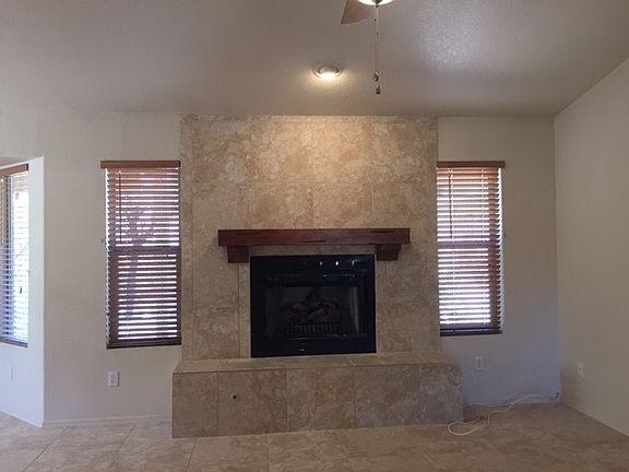 Tiled fireplace with gas logs
