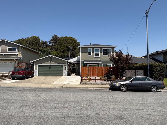 Front curbside view, street parking