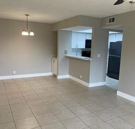 5th image of 1508 SE Royal Green Cir APT E205