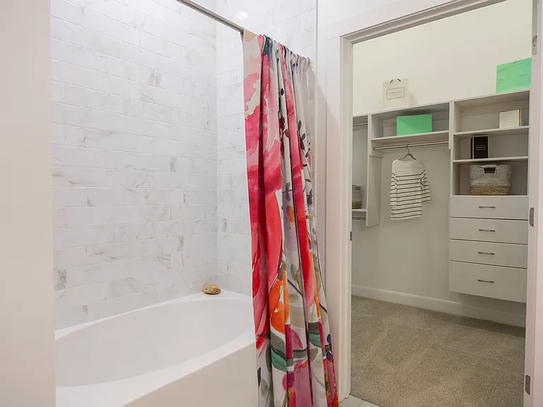 Showers and Soaking Tubs with Floor-to-Ceiling Tile