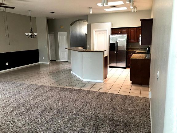 View from great room into kitchen and dining area.