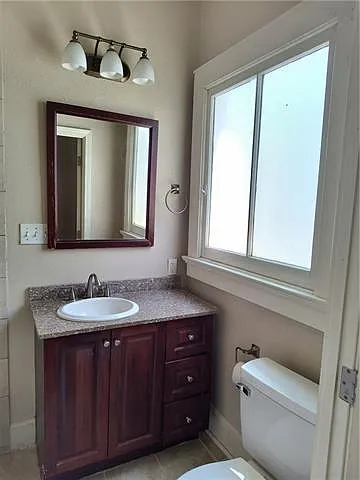 7615 Dominican St — Photo 13