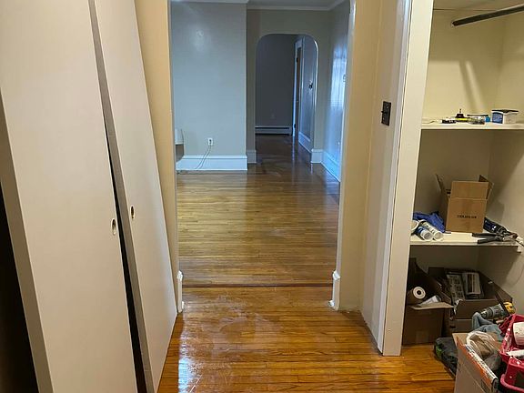 The hallway leads to the kitchen... With a BIG closet for additional space.