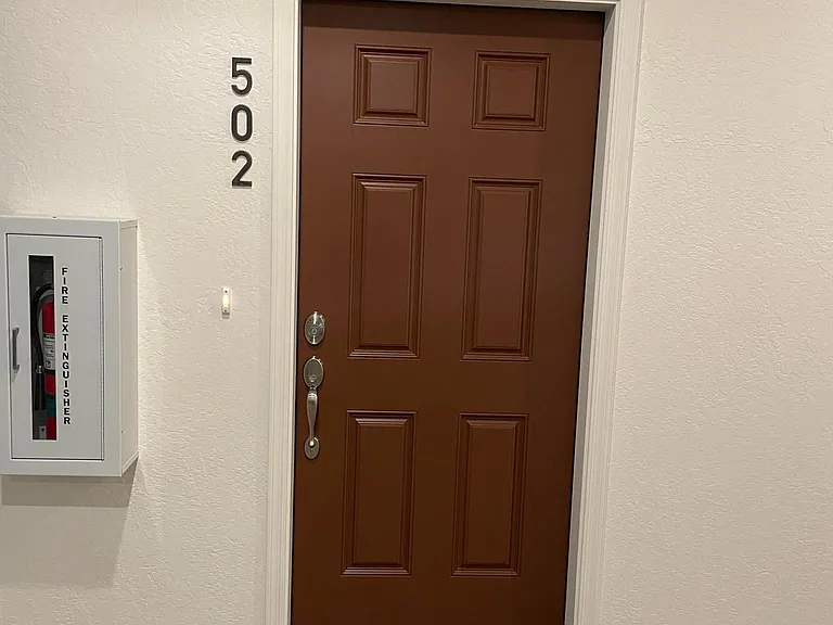 Interior Entrance from the Hallway with Elevator