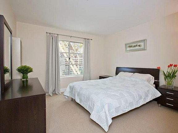 Holds king-sized bed, two nightstands, and a dresser - hardwood floors now in bedroom, too
