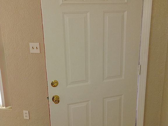All Doors have been painted, but this is the newly painted front door beside newly painted walls. Here you can clearly see the beautiful color of the walls.