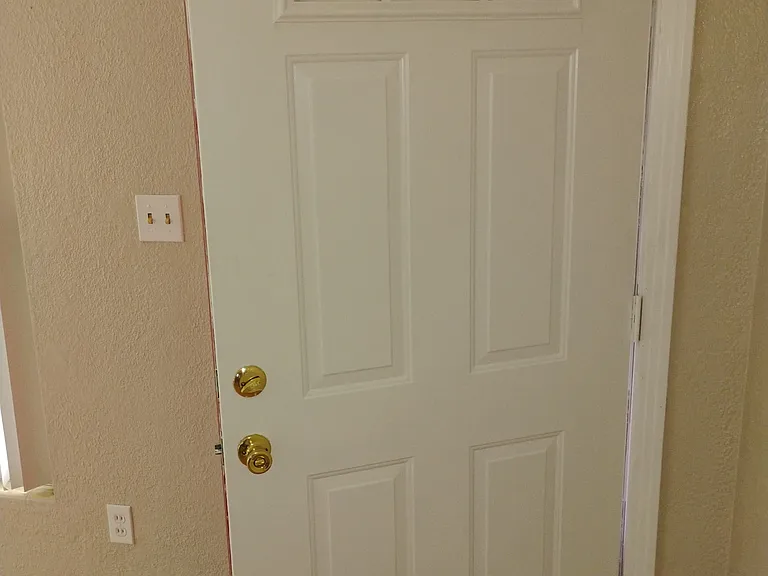 All Doors have been painted, but this is the newly painted front door beside newly painted walls. Here you can clearly see the beautiful color of the walls.