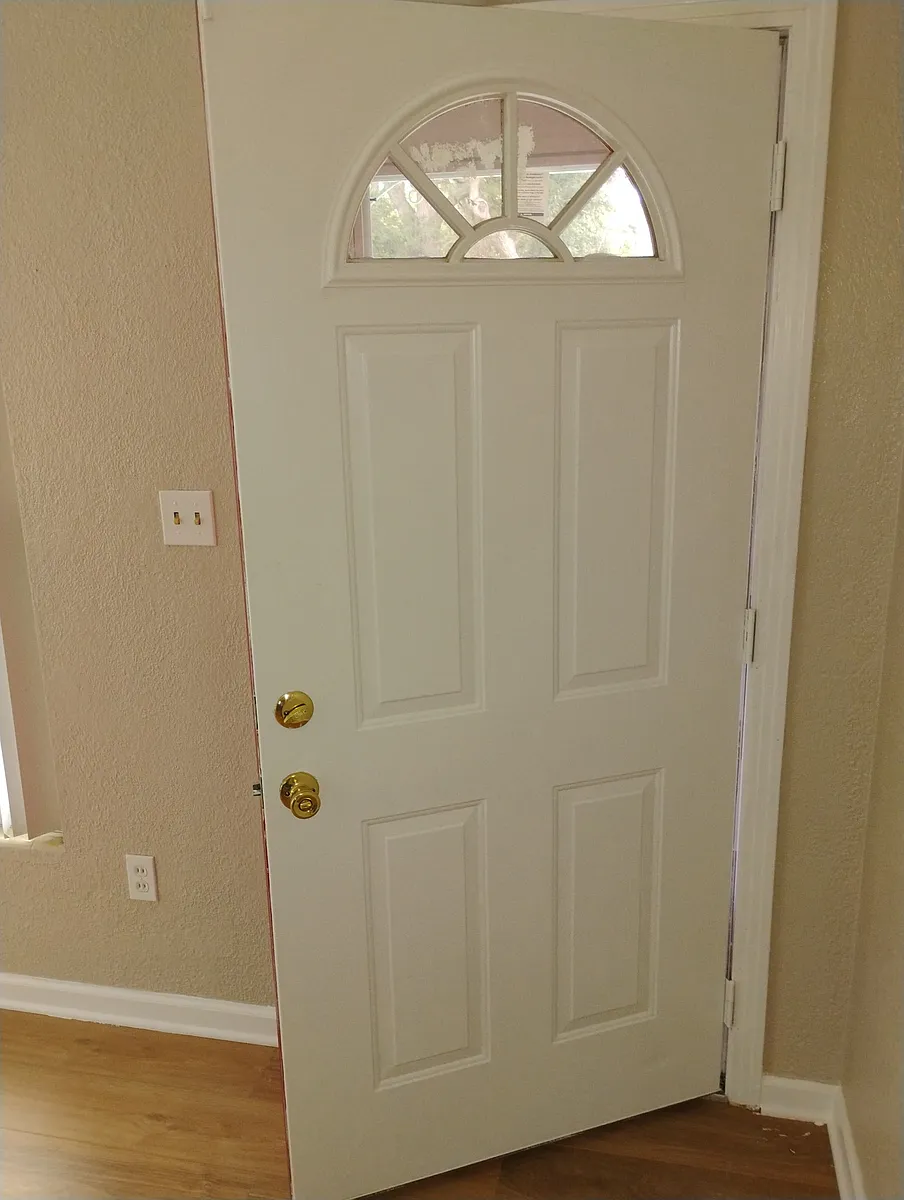 All Doors have been painted, but this is the newly painted front door beside newly painted walls. Here you can clearly see the beautiful color of the walls. - 501 16th St NW