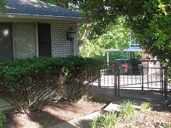 gate at sidewalk entry