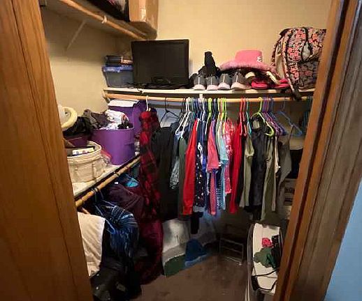 Enjoy the luxury of a spacious walk-in closet with ample shelving and storage for all your wardrobe needs.