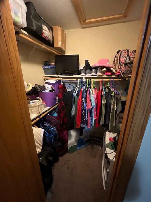 Enjoy the luxury of a spacious walk-in closet with ample shelving and storage for all your wardrobe needs.