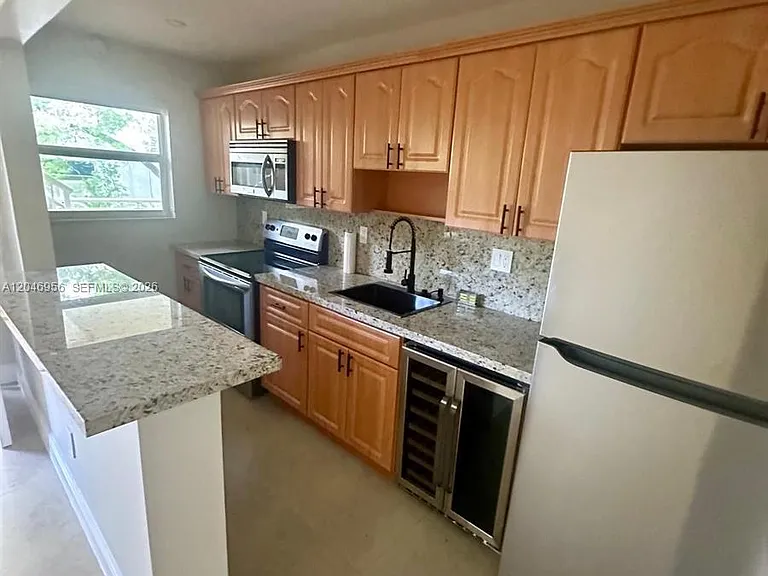 5839 SW 74th Ter #104 — Photo 12