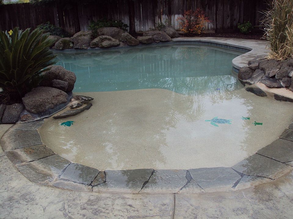 pebblesheen beach entrance with additional water feature