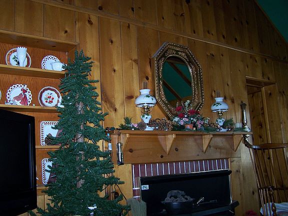 Mantle over wood stove