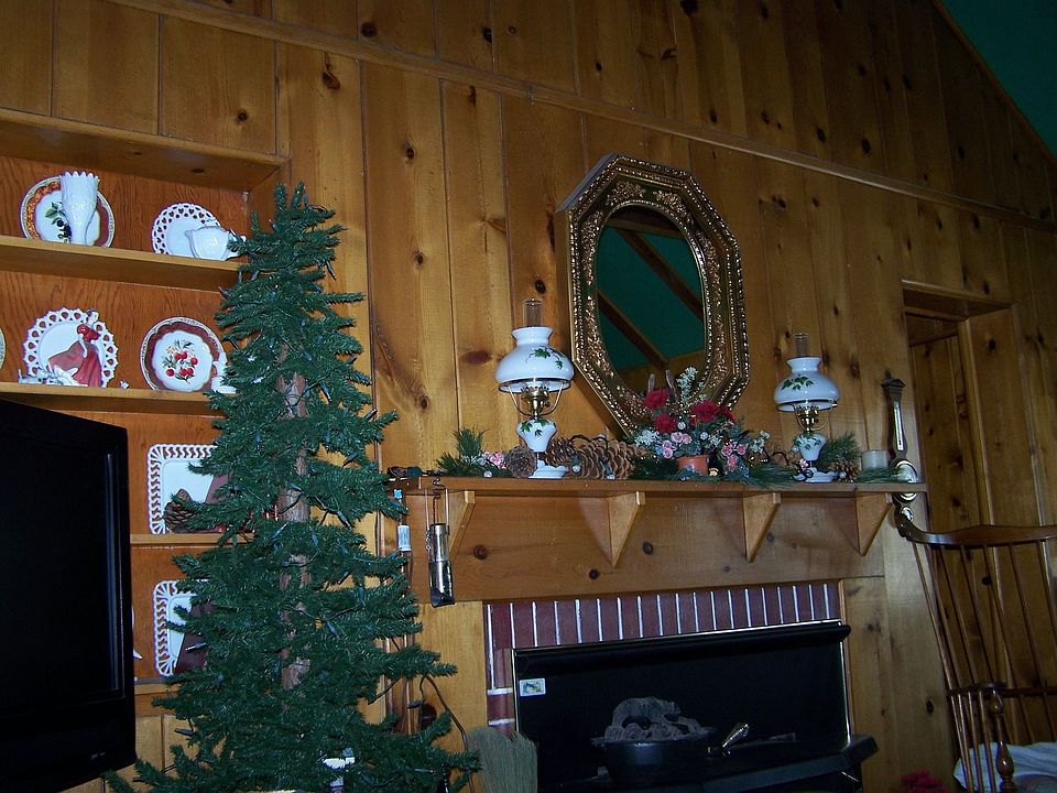 Mantle over wood stove