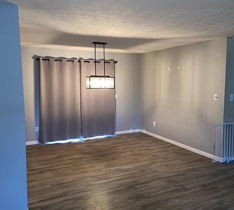 dining area with sliding door to backyard