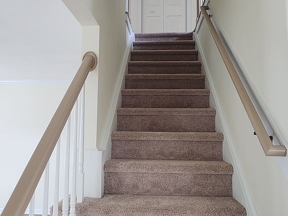 Linen closet at top of stairs. New combination Fire/CO detectors throughout.
