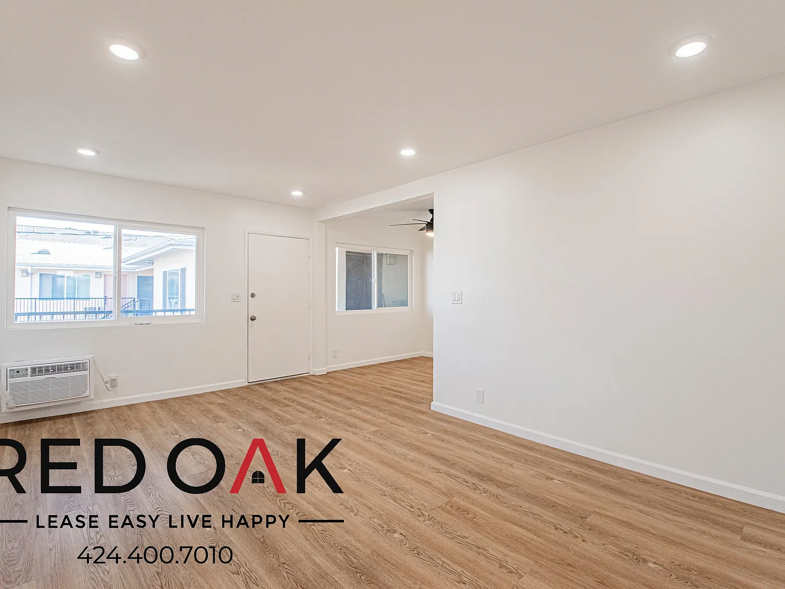 Bright 1-Bed with Hardwood-Style Floors, Air Conditioning, On-Site Laundry and Parking Included i... — Photo 1