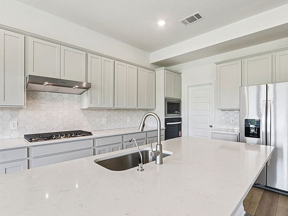Cook a delicious meal in this beautiful kitchen.