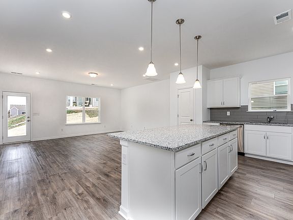 Example of the Ellenwood floor plan by Smith Douglas homes. Interior colors and selections could v