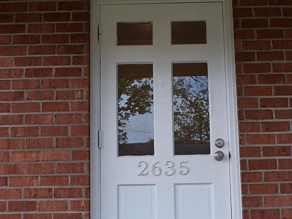 Front door w/ new paint & numbers