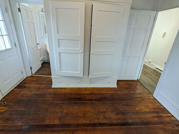 Bedroom with built-in closet (kitchen to the right; bathroom and deck to the left)