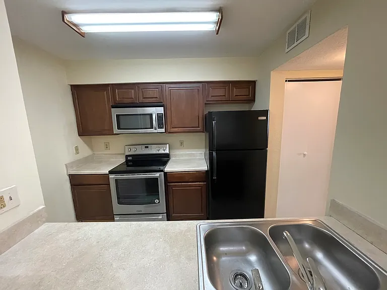 2881 N Oakland Forest Dr #102 — Photo 2