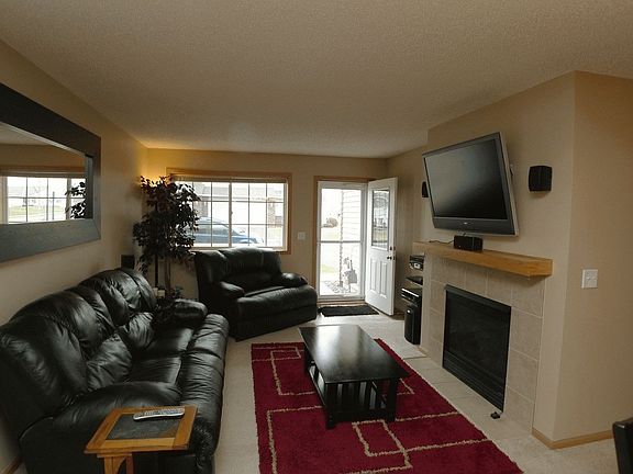 Living rm has a fireplace and rm size is 14 x 10.