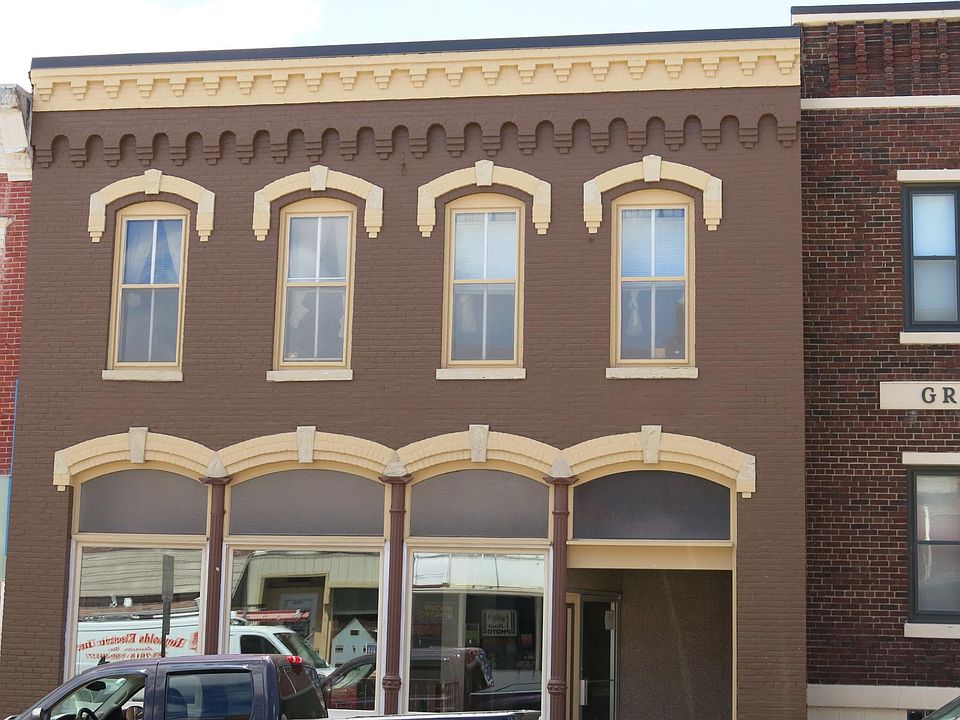 The apartment is on the second story of this building.