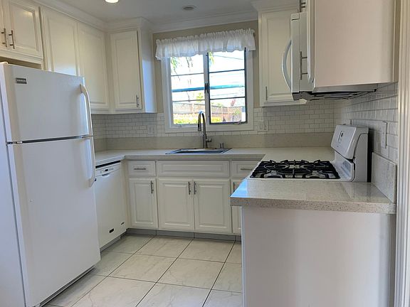 Kitchen (Freshly renovated with new stove, fridge, and dishwasher)