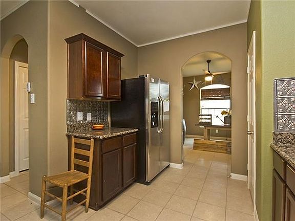 Archway to the formal dining area.