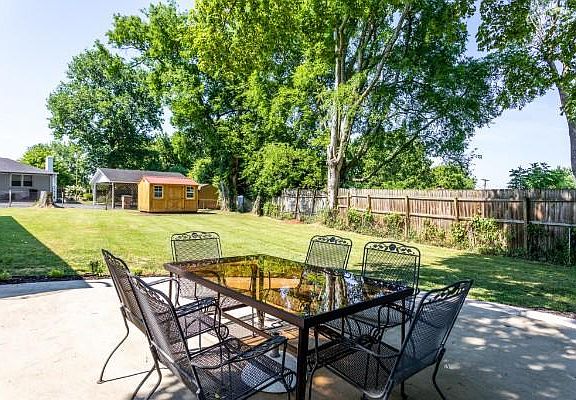 Very nice concrete patio right outside the home. Great backyard for outdoor games.