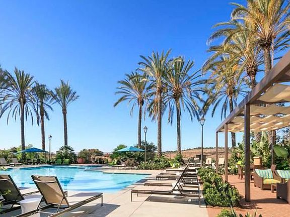 awesome pool area - complex has 2 huge pools, hot tubs, outdoor fire pits, outdoor kitchen areas... RESORT LIVING at its finest!