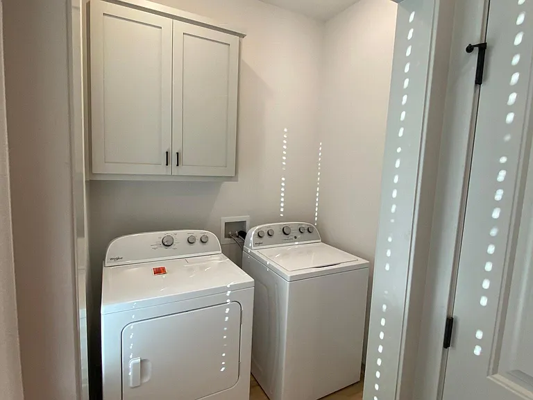 laundry (directly to left of front door)