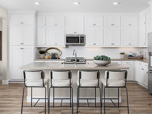 Kitchen at Plan 3001, Villas at Arbor Ranch