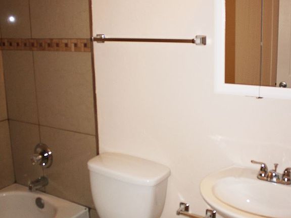 5th image of 304 Whispering Sands Ct SE APT A